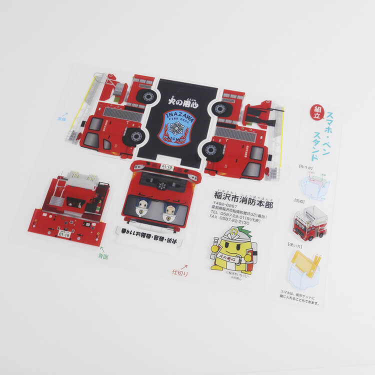 稲沢市消防本部様_組み立てスマホ・ペンスタンド(乗り物タイプ)-シート-写真
